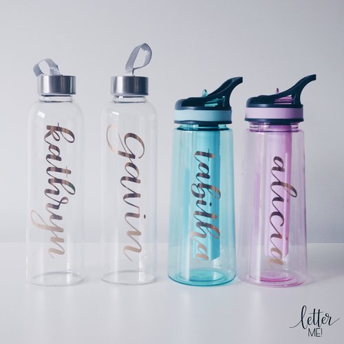 Selection of clear sports bottles customised with names - Bachelorette Party Ideas for the Active Bride