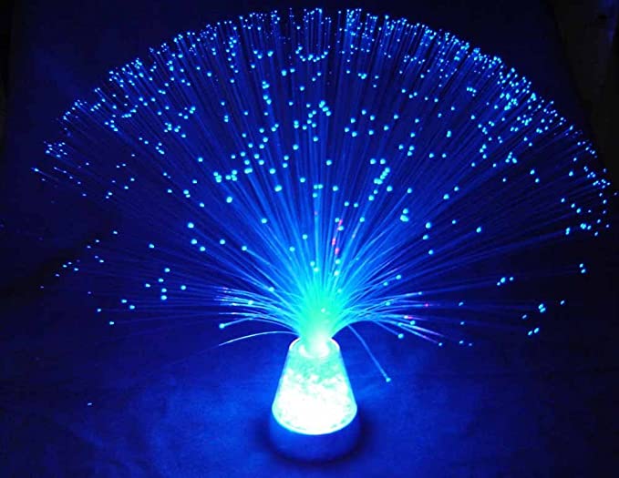 a fibre optic lamp that resembles a firework or a glowing alien plant 